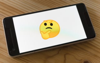 Thinking emoji on phone