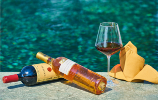 wine bottles by the pool