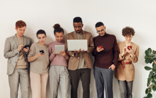 People on their mobile devices