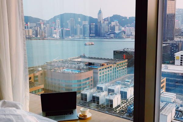 hotel windowsill with laptop