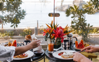 Breakfast on a patio overlooking the water