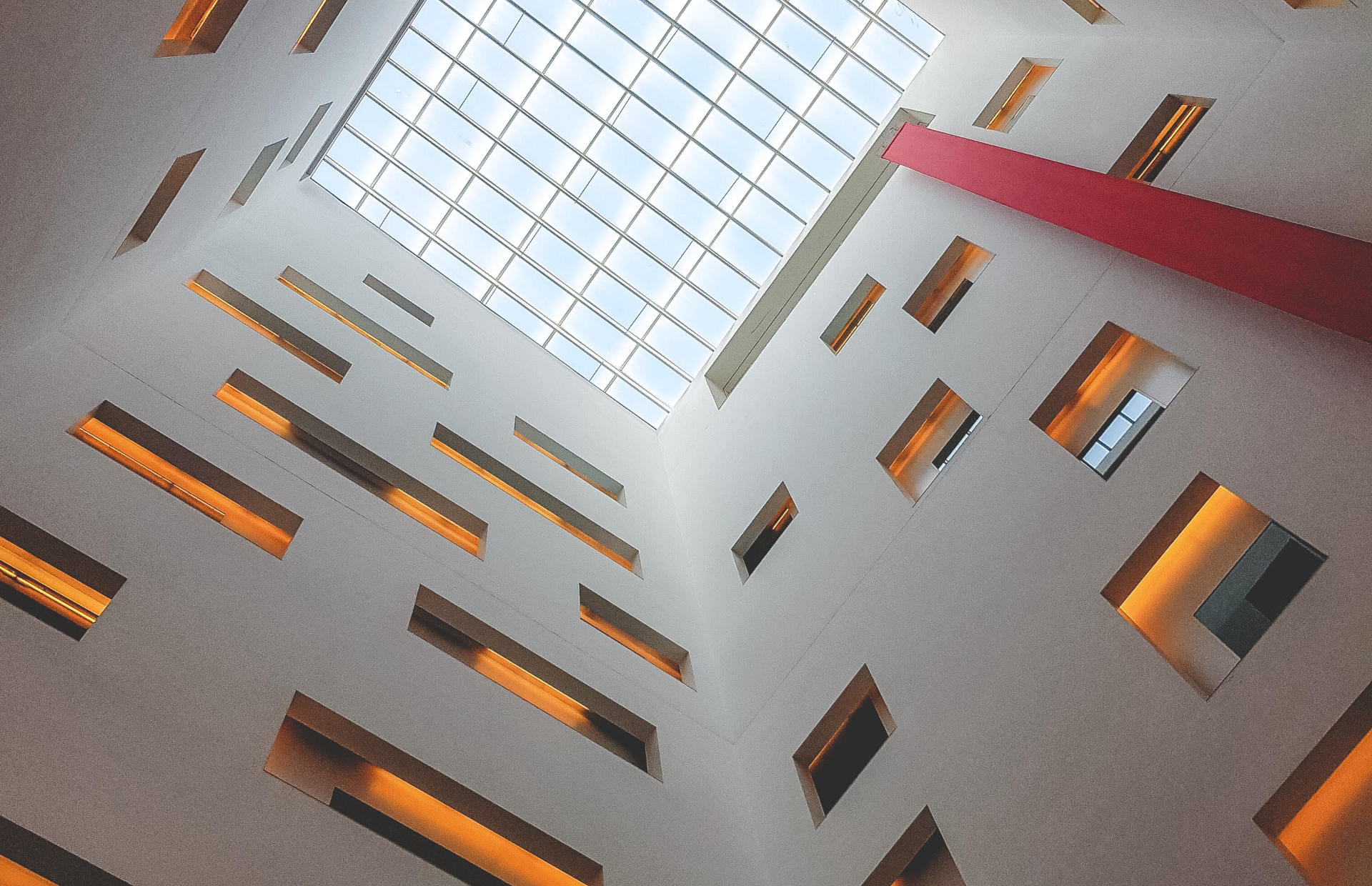 A ground-up view reveals a hotel skylight.