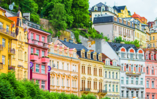 Colorful hotel buildings line the street.