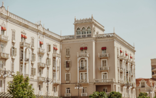 A hotel stands more than 3 stories tall.