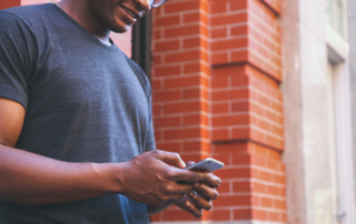 Someone is looking down at their phone.