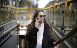 Hotel guest communicating via cellphone