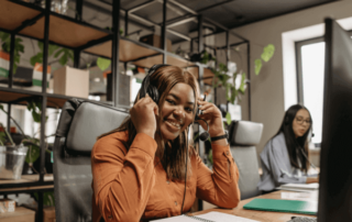A call center agent wears a headset.