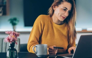 Image of women booking an online hotel stay
