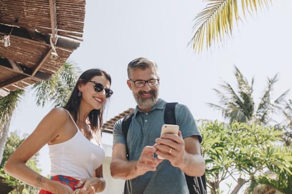 Woman and man on honeymoon trip.