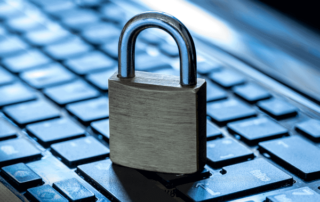 Padlock on computer keyboard