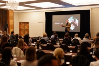 Revinate CEO Bryson Koehler on stage NAVIGATE London