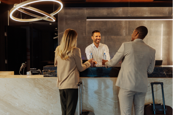 Guests check in at the front desk