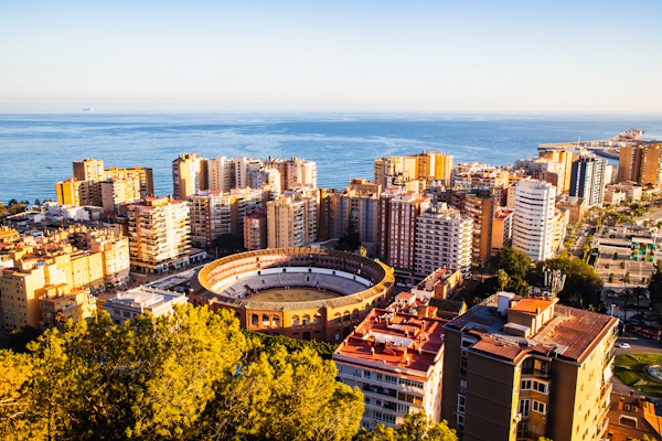 Stadium surrounded by hotels.